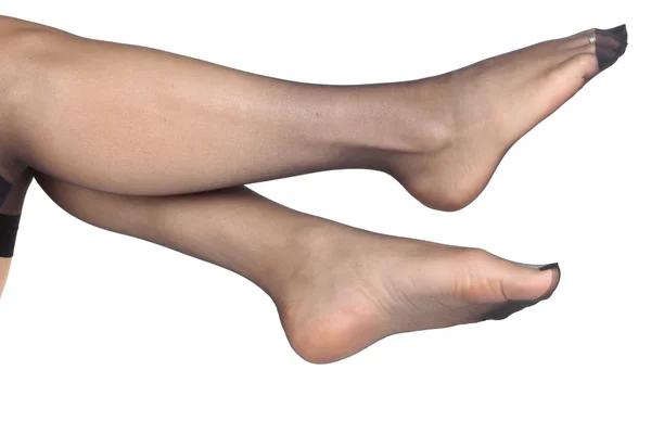 Žena Nohy Síťované Punčocháče Bílé Pozadí — Stock fotografie