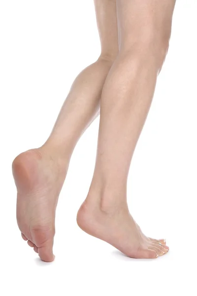 Donna gambe isolate su sfondo bianco — Foto Stock