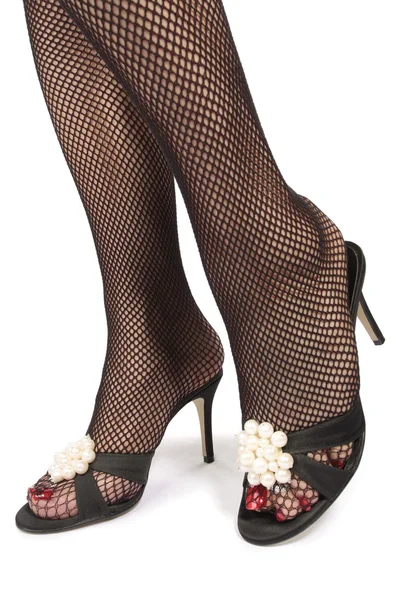 Nő lábát a fekete magas sarkú cipő — Stock Fotó