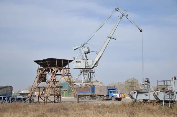Big crane in the city river port — Stock Photo, Image