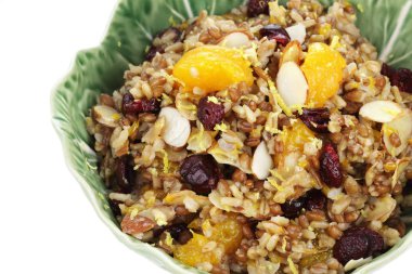 Pilaf with whole grains, nuts, and dried fruit for a delicious side dish or breakfast. Clipping path included. clipart