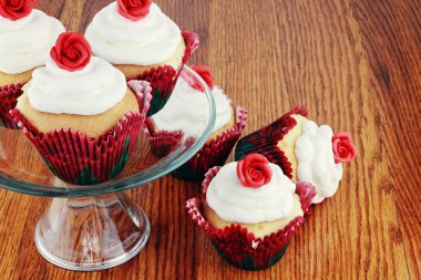 Valentine's Day cupcakes on a cake stand. clipart