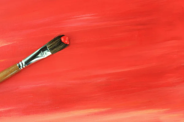 Pinsel Gegen Ein Rotes Abstraktes Gemälde — Stockfoto