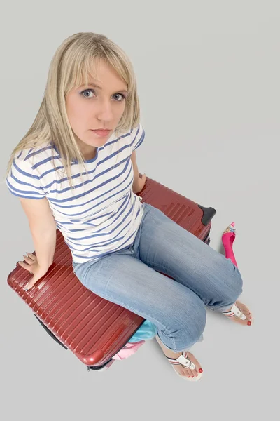 Woman and her suitcase — Stock Photo, Image