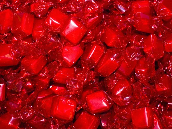 Barevné hard candy obaly jako pozadí — Stock fotografie