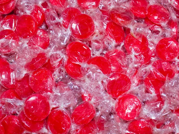 Colorful Hard Candy in Wrappers as a Background — Stock Photo, Image