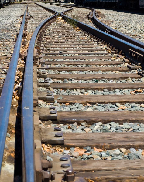 stock image Old Railroad Tracks at a Junction on a Sunny Day