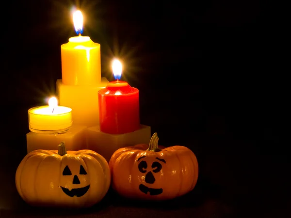 stock image Mini Pumpkins with Funny Faces and Candles