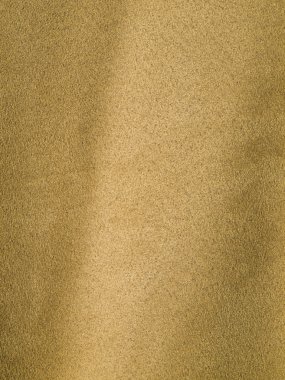 Full Frame Background of Biege or Tan Suede-like Fabric clipart