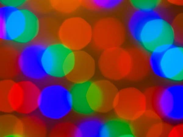 Weihnachtsbeleuchtung aus dem Fokus Hintergrund abstrakt — Stockfoto