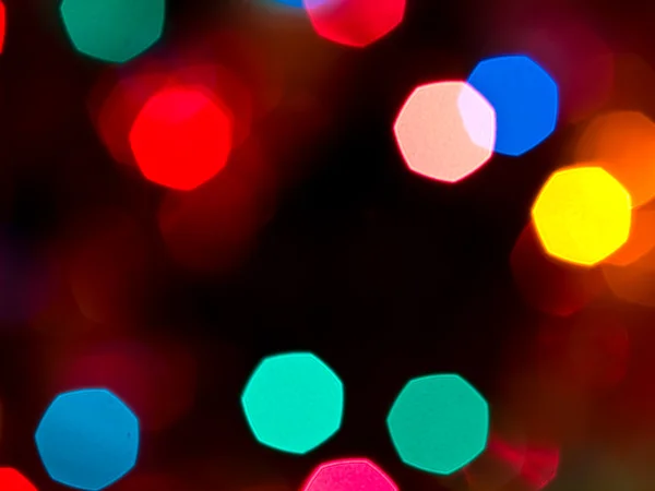 Χριστούγεννα φώτα έξω από εστίαση αφηρημένα φόντο — Φωτογραφία Αρχείου