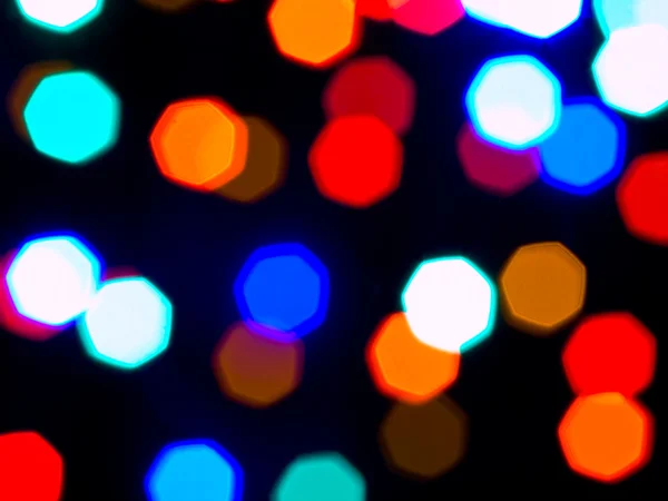 Weihnachtsbeleuchtung aus dem Fokus Hintergrund abstrakt — Stockfoto