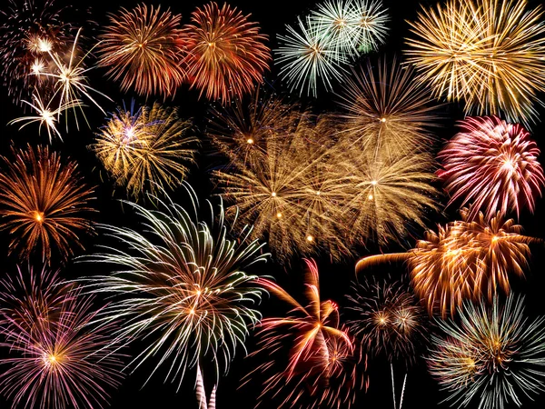 Collage van vuurwerk tegen een zwarte lucht — Stockfoto