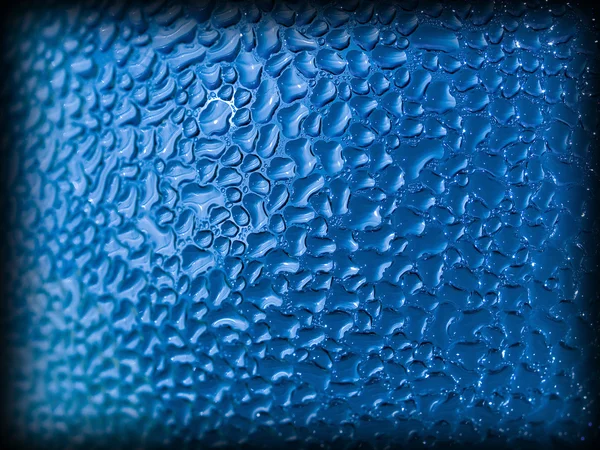 Water Droplets Formed Condensation Blue Bottle Dark Edge Border — Stock Photo, Image