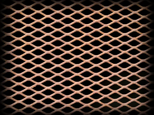 Fejsze alakú egy alagút lyuk rozsdás fém rostélyos — Stock Fotó
