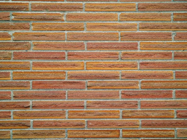 오렌지, 빨강, 그리고 갈색 벽돌 벽 배경 — 스톡 사진