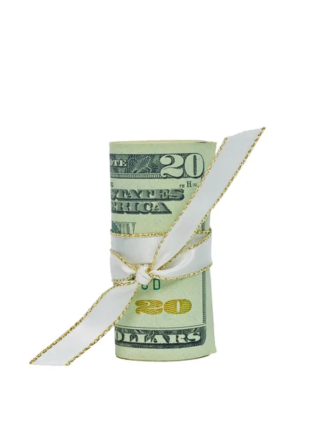 stock image A single US Banknote rolled and tied with a white ribbon.
