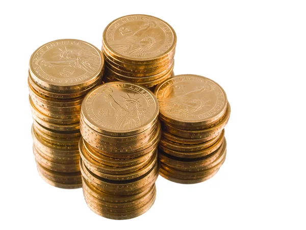 Four stacks of new gold US Dollar Coins — Stock Photo, Image