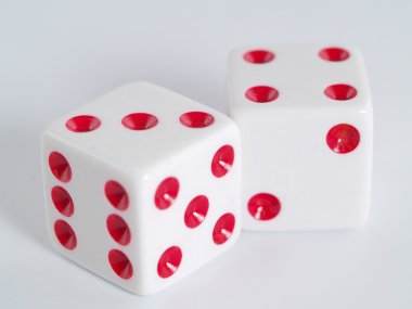 Two white dice closeup on a white background clipart