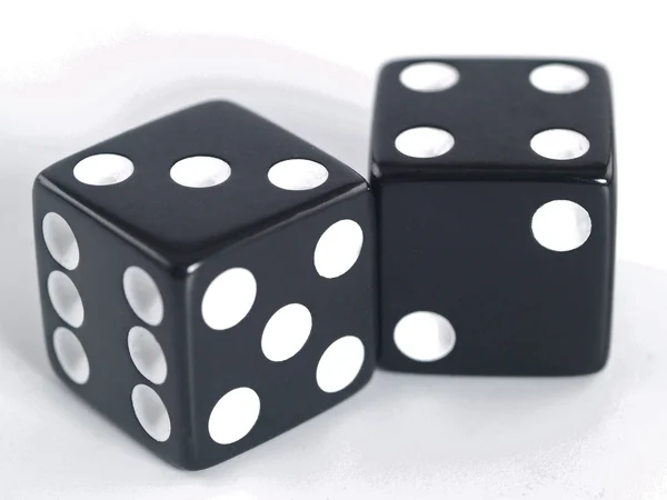 Two black dice closeup on a white background — Stock Photo, Image