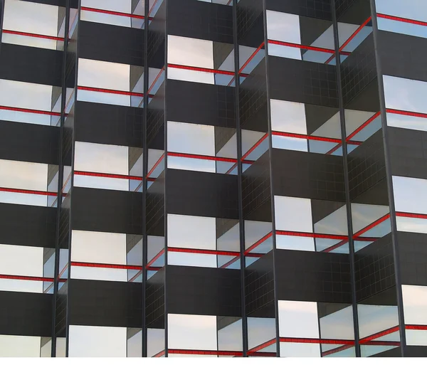 Antecedentes de un edificio de azulejos negros y espejados —  Fotos de Stock