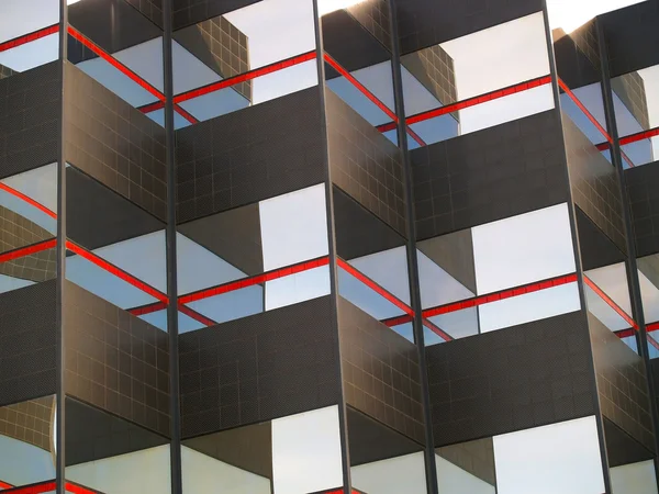 Antecedentes de un edificio de azulejos negros y espejados — Foto de Stock