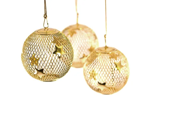Een holle gouden draad mesh kerst ornament met sterren — Stockfoto