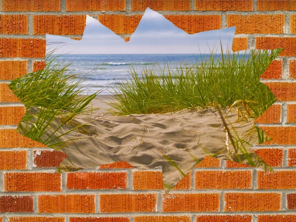 Sandy Path with Beach Grass Behind a Hole in a Brick Wall