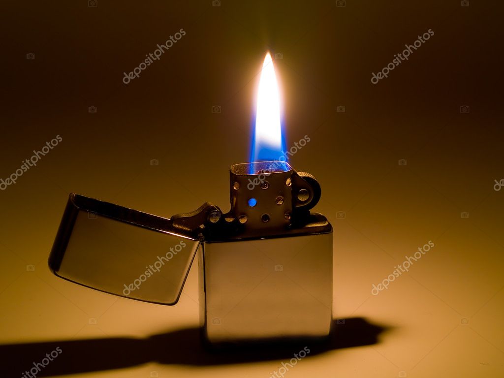stil Centimeter tilbage A cigarette lighter with a yellow and blue flame Stock Photo by  ©Frankljunior 5179079