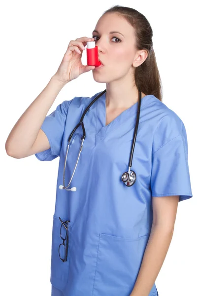 Pretty Nurse Using Asthma Inhaler — Zdjęcie stockowe