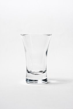 One empty glass isolated on a white clipart