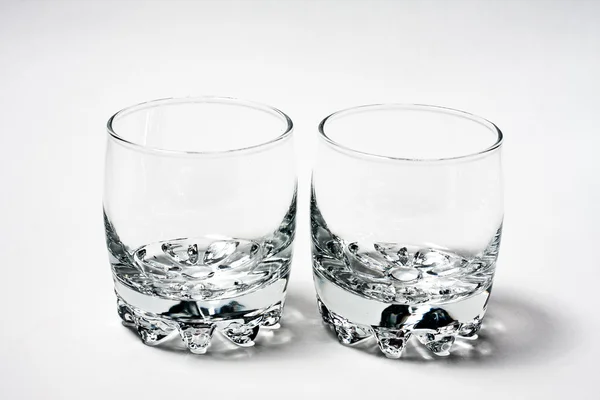 Leeres Glas auf grau — Stockfoto
