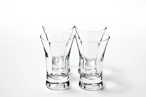 Čtyři prázdnou sklenici izolovaných na bílém — Stock fotografie