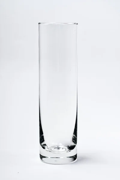 Um copo vazio isolado em um branco — Fotografia de Stock