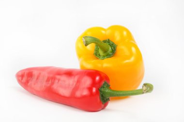 Sweet red and yellow paprica isolated on white