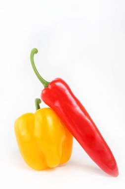 Sweet red and yellow paprica isolated on white