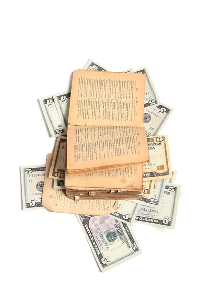 Kniha a peníze izolovaných na bílém — Stock fotografie