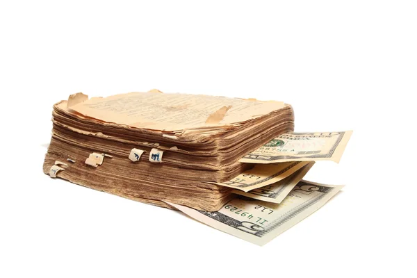 Libro y dinero aislados en blanco — Foto de Stock