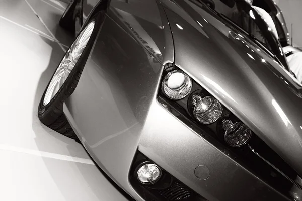 Car on exhibition, headlight close-up — Stock Photo, Image
