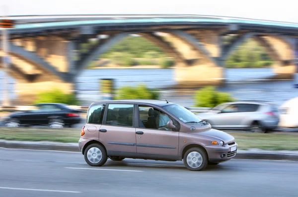 Brown car on road in city — Stock Photo, Image
