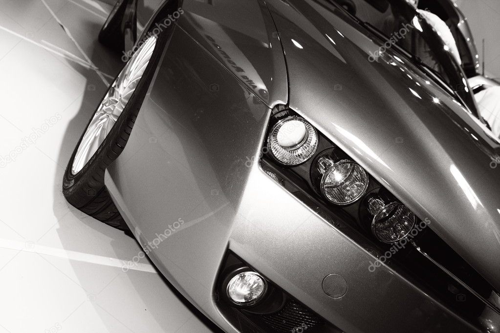 Car on exhibition, headlight close-up