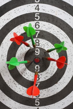 Six dart in center dartboard clipart