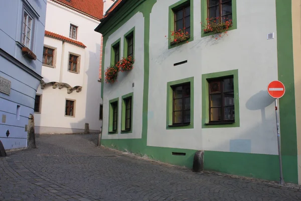 stock image Old city street, houses with windows