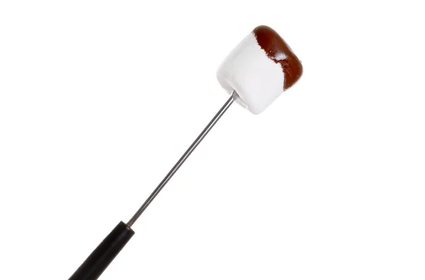 Chocolate covered marshmallow on fondue stick — Stock Photo, Image