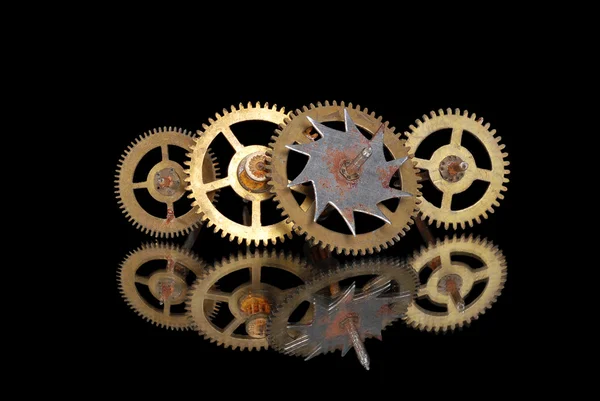 Four old rusty clock gears — Stock Photo, Image
