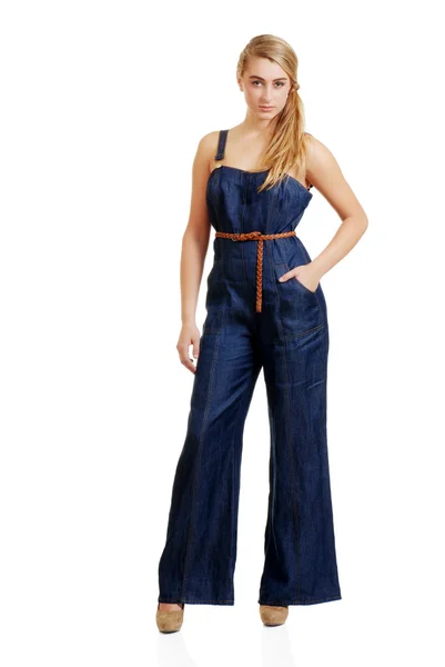 Young female teenager in jeans jumpsuit — Stock Photo, Image