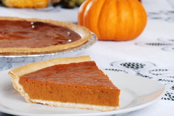 Slice of fresh baked pumpkin pie — Stock Photo, Image