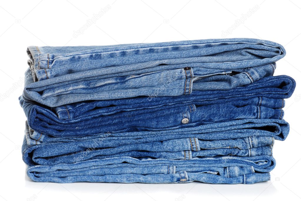 Pile of folded blue jeans