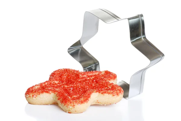 Christmas cookie with cutter — Stock Photo, Image