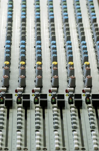 Sound board with focus on yellow and brown controls — Stock Photo, Image